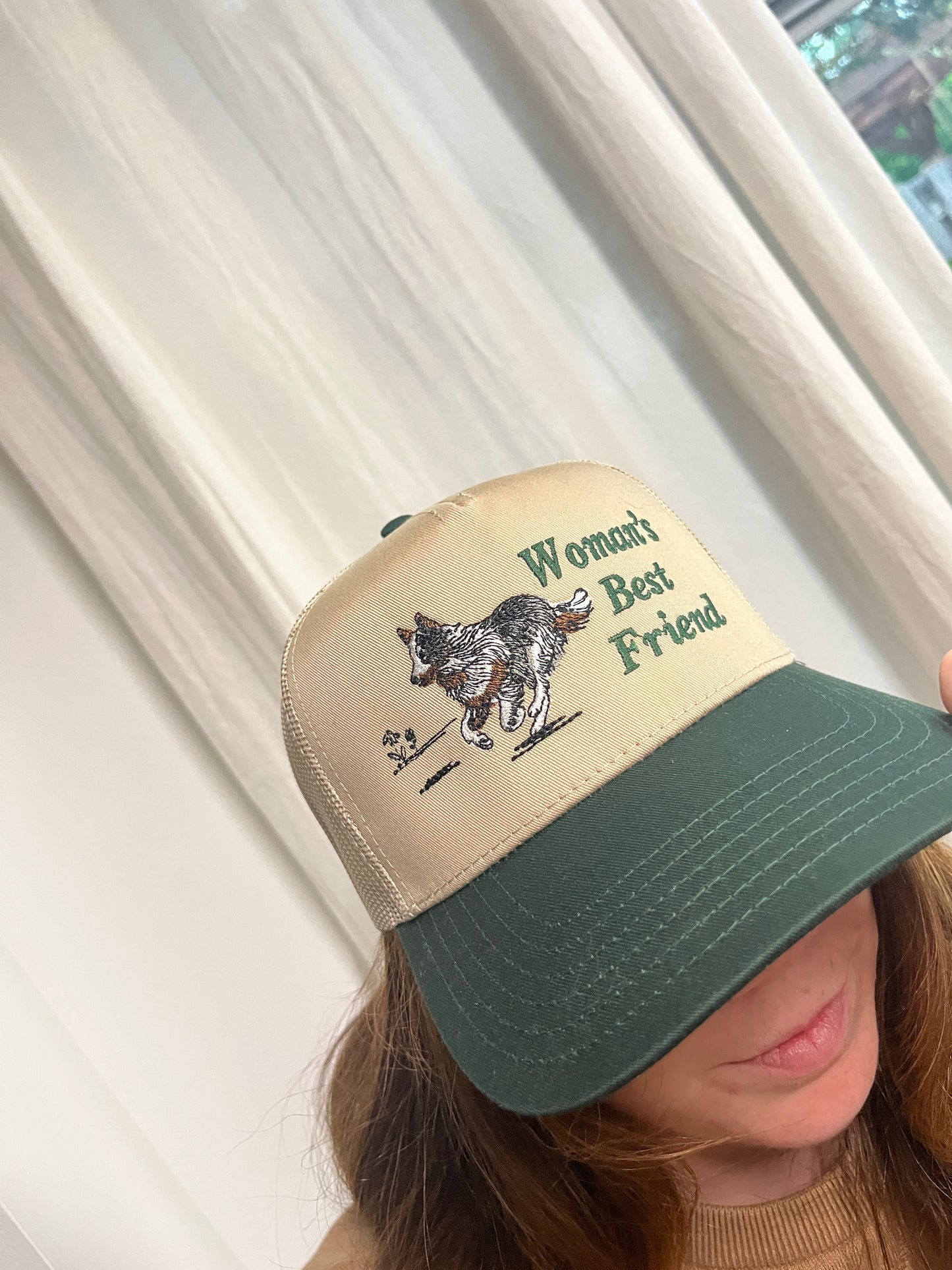A Woman's Best Friend Trucker Hat